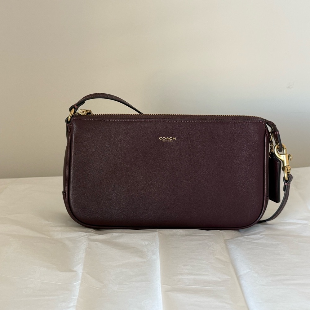 Coach Plum Leather Wristlet Clutch with Gold Hardware